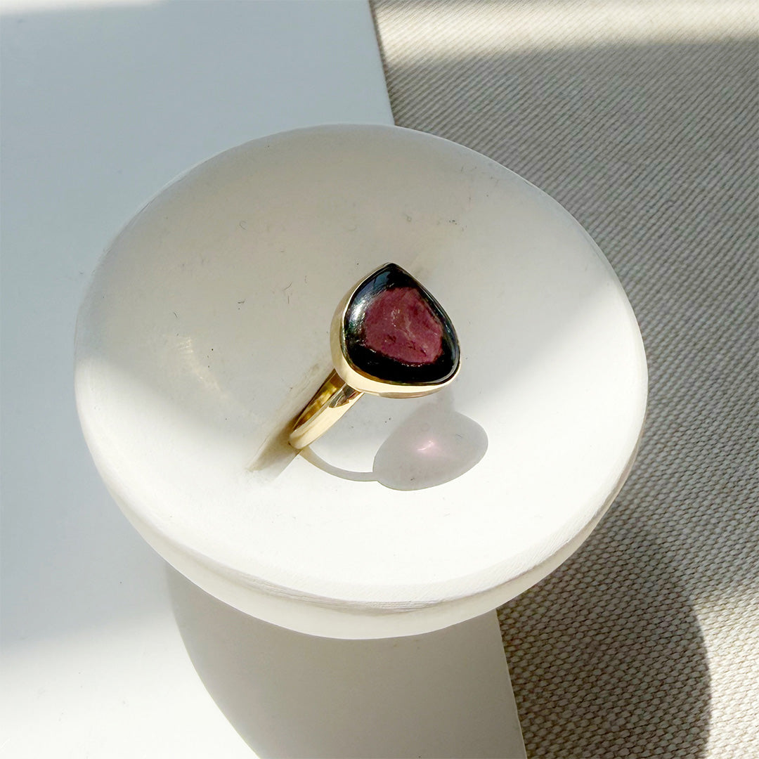 Watermelon tourmaline one of a kind ring in a white dish
