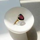 Watermelon tourmaline one of a kind ring in a white dish