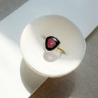 Watermelon tourmaline one of a kind ring in a white dish