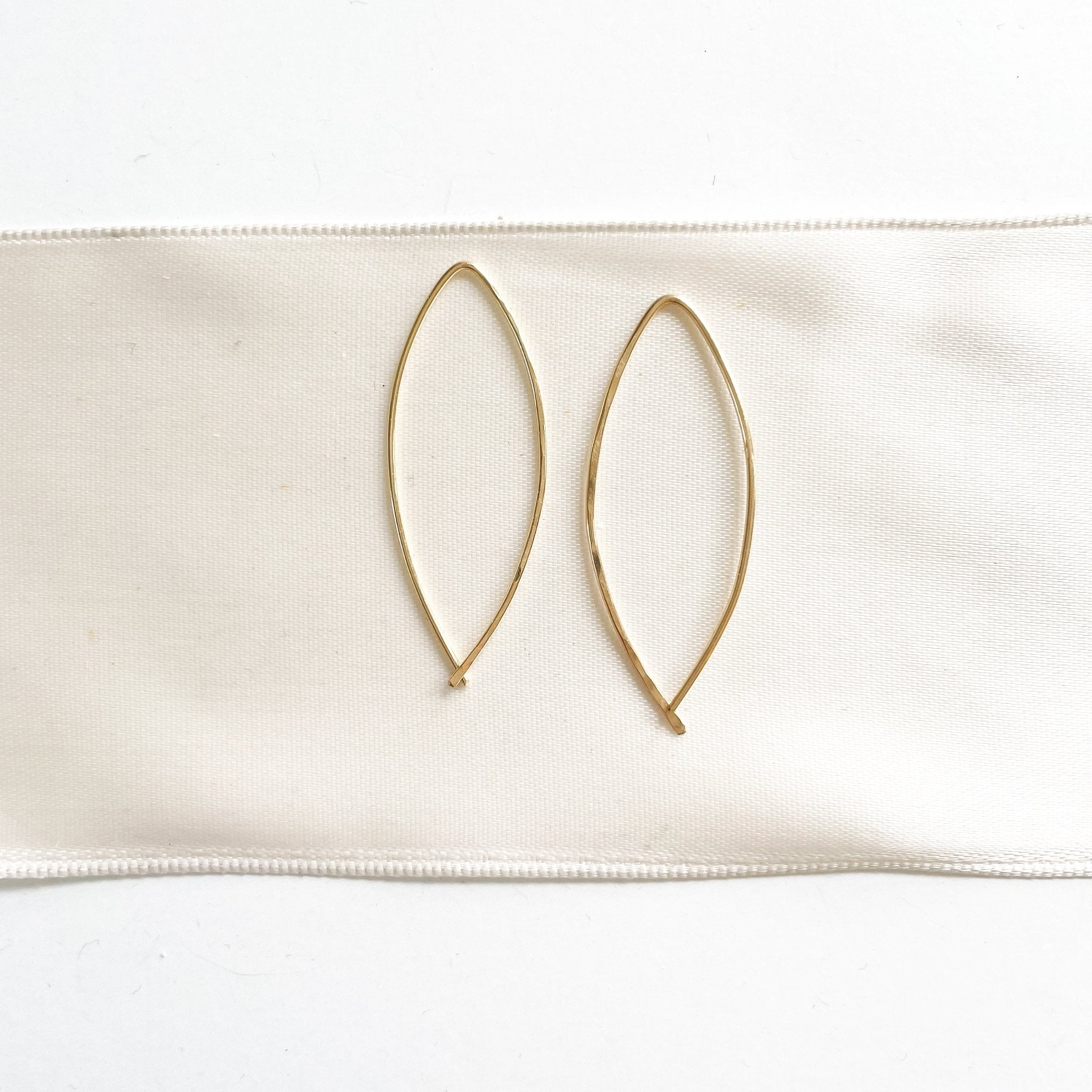 Alice Earrings by Sarah Cornwell Jewelry. Simple lightweight gold threader earrings on white background.