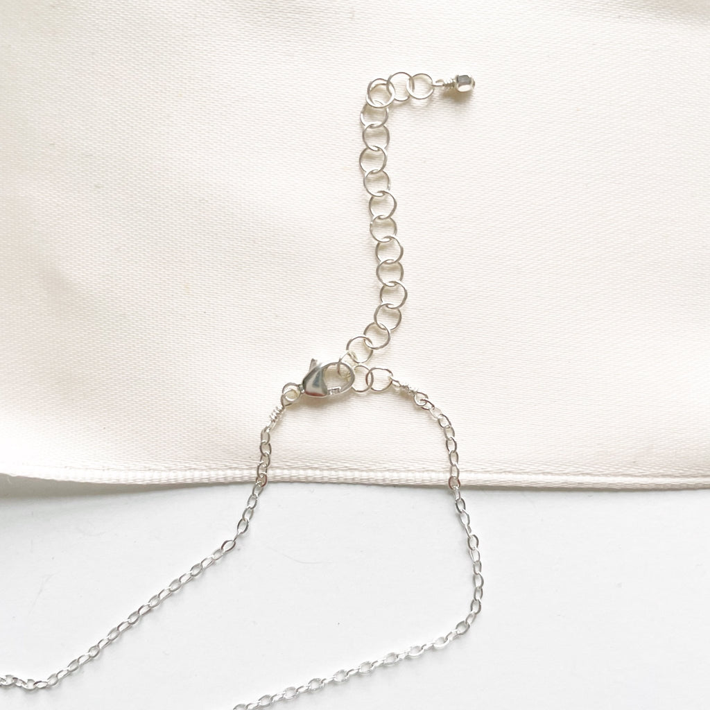 Clasp of silver dainty pearl layering necklace. Carys Necklace by Sarah Cornwell Jewelry