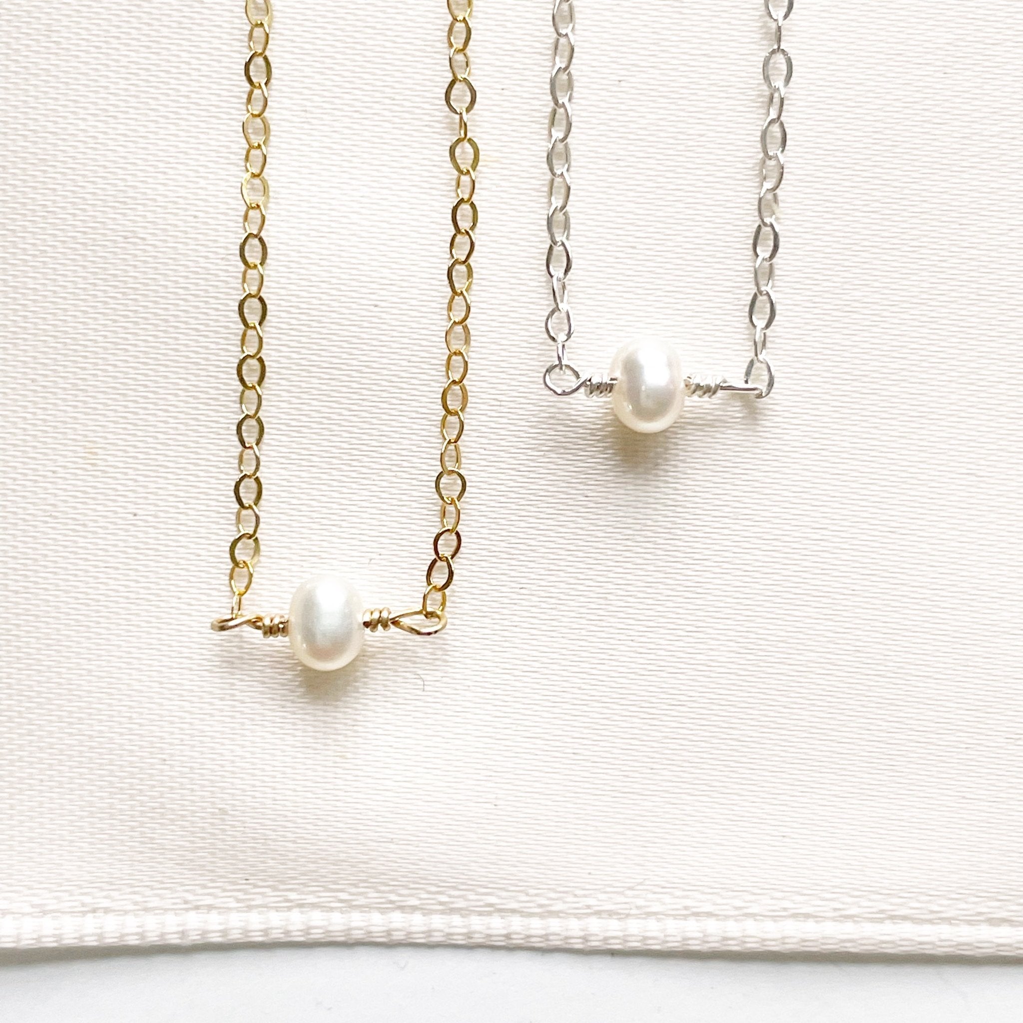 Gold and silver dainty pearl layering necklaces. Carys Necklace by Sarah Cornwell Jewelry
