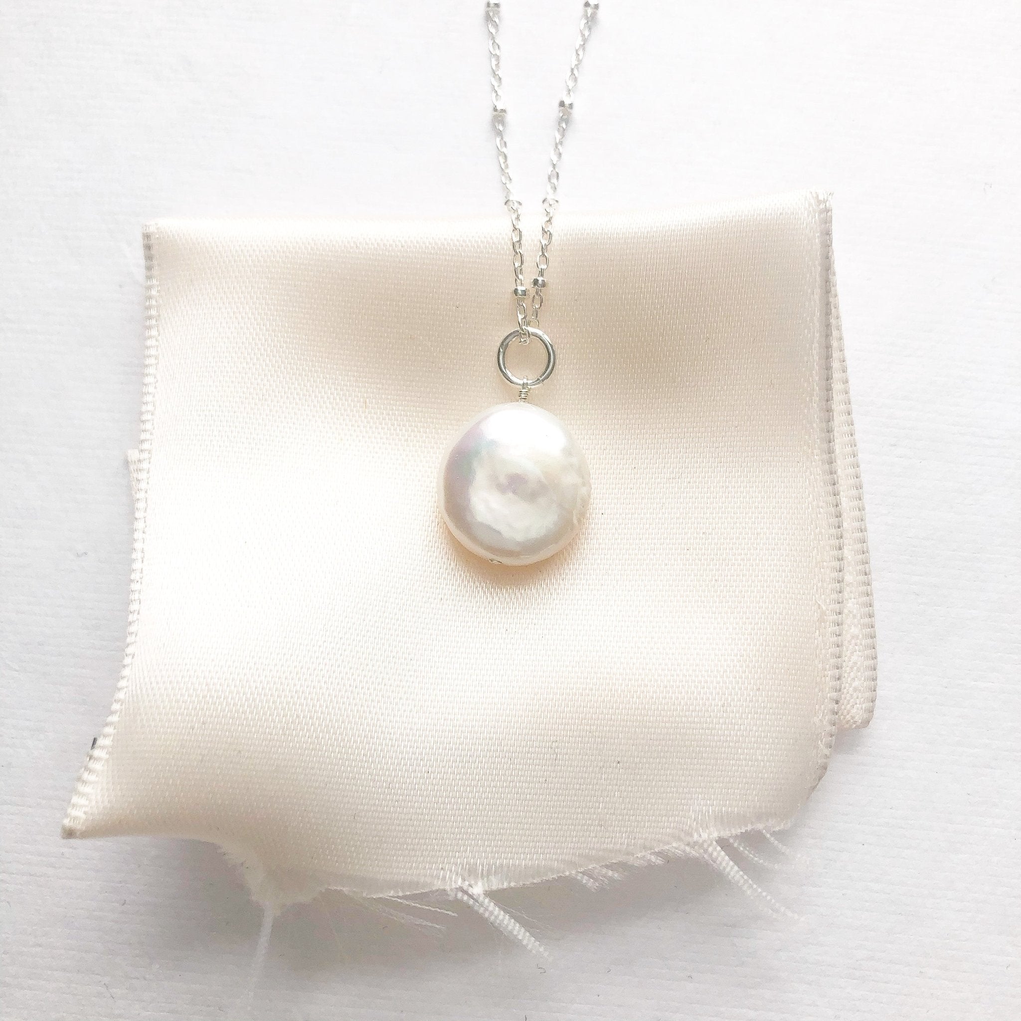 Silver and coin pearl long statement necklace on a link ball chain. Deene Necklace by Sarah Cornwell Jewelry