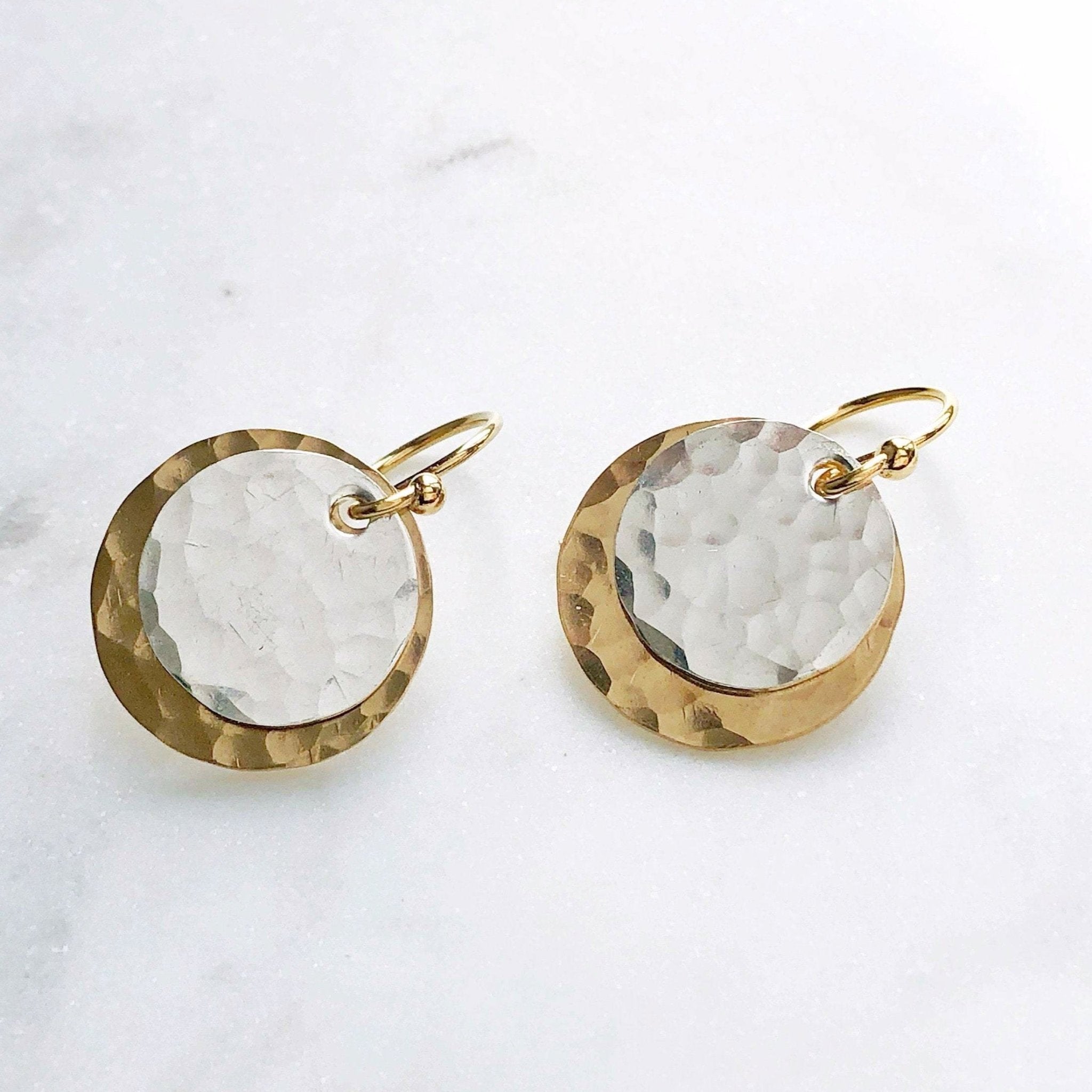 Eleanor Earrings by Sarah Cornwell Jewelry.  Two toned gold and silver mixed metal textured circle earrings on a white background.
