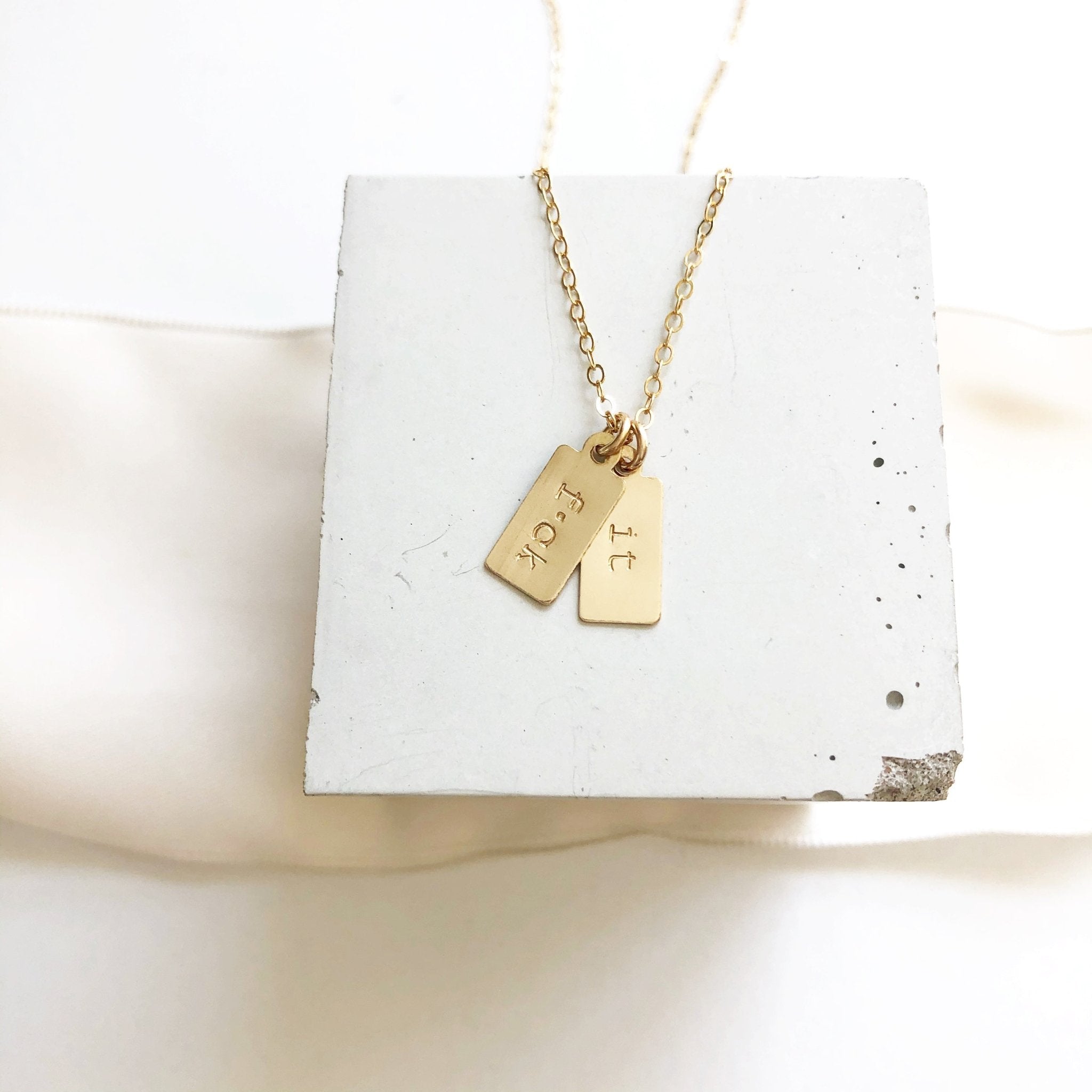 Gold double tag "fuck it" layering necklace. F*ck It Necklace by Sarah Cornwell Jewelry