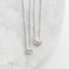 2 silver necklaces with 2 and 4 tiny silver rings. Honor Necklace by Sarah Cornwell Jewelry