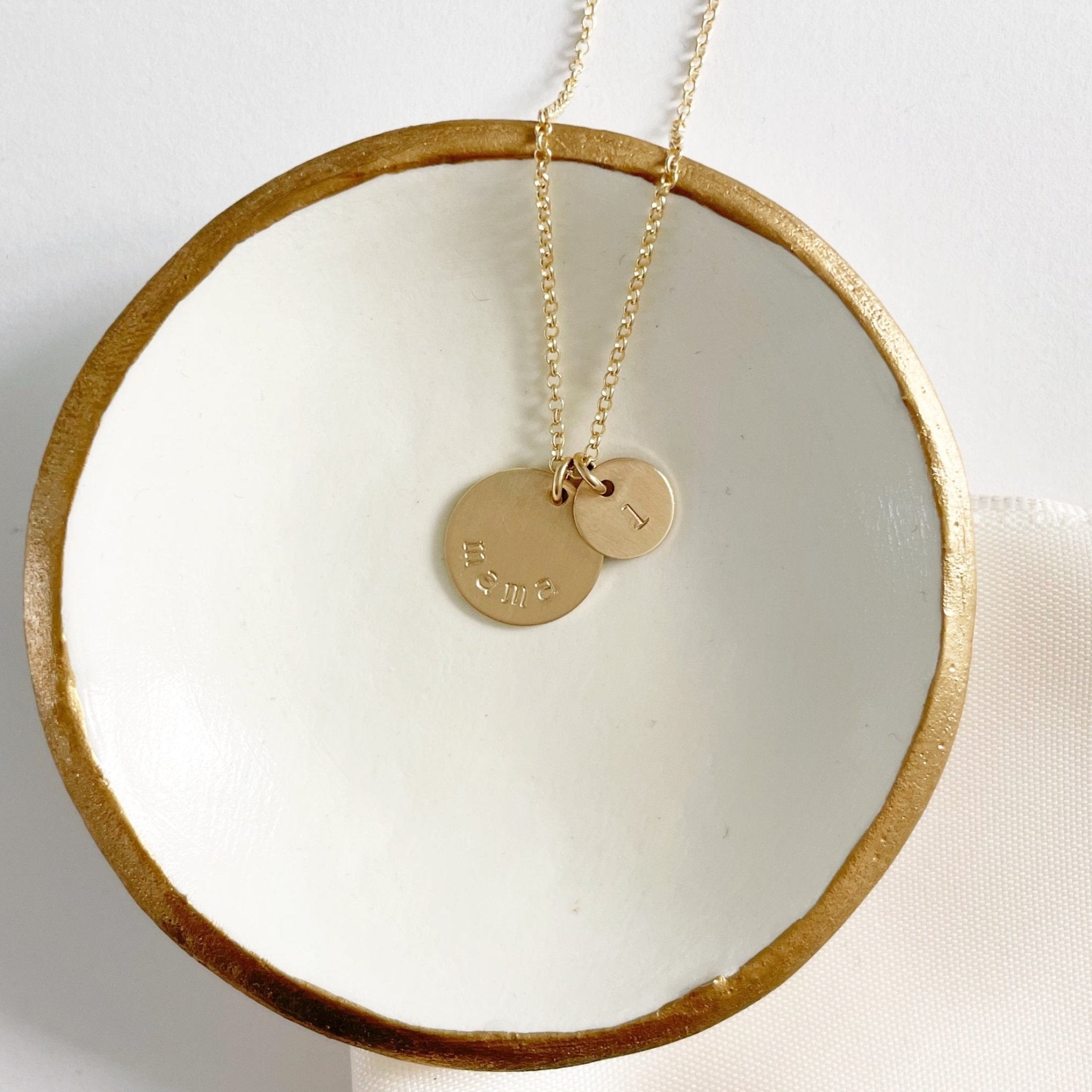Gold mama stamped disc necklace with a tiny stamped initial discs. Mama Necklace by Sarah Cornwell Jewelry