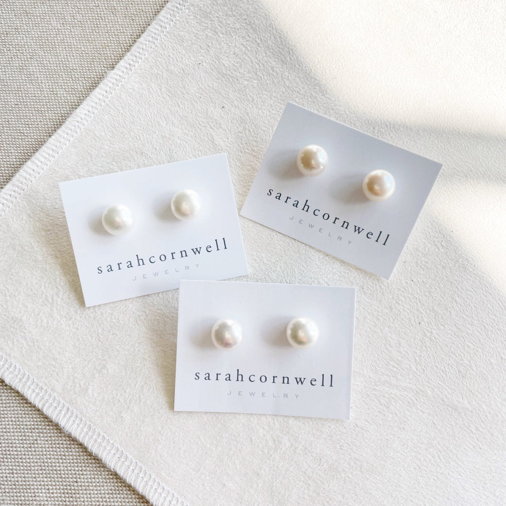3 pairs of oversized 9.5-10 mm creamy white oyster pearl stud earrings. Oyster Pearl Studs by Sarah Cornwell Jewelry