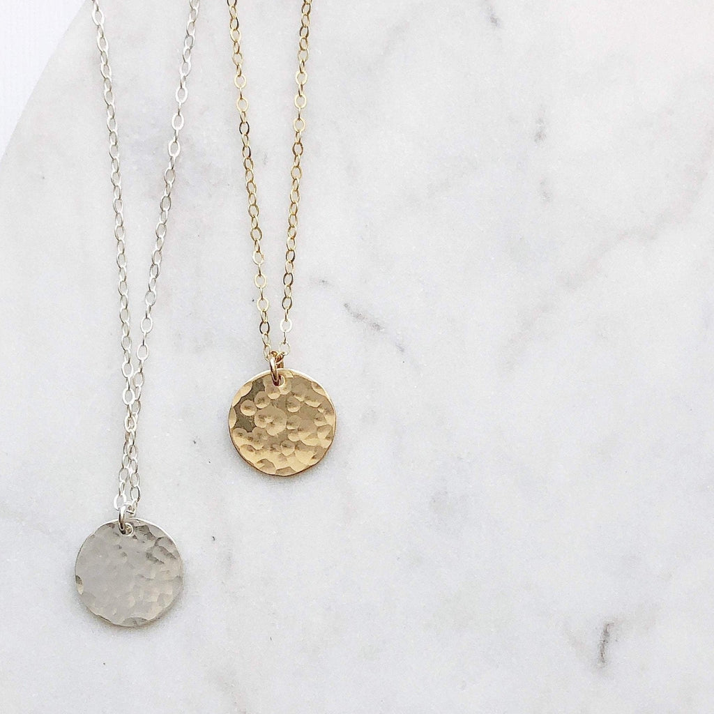 Gold and silver textured disc necklaces. Ross Necklace by Sarah Cornwell Jewelry