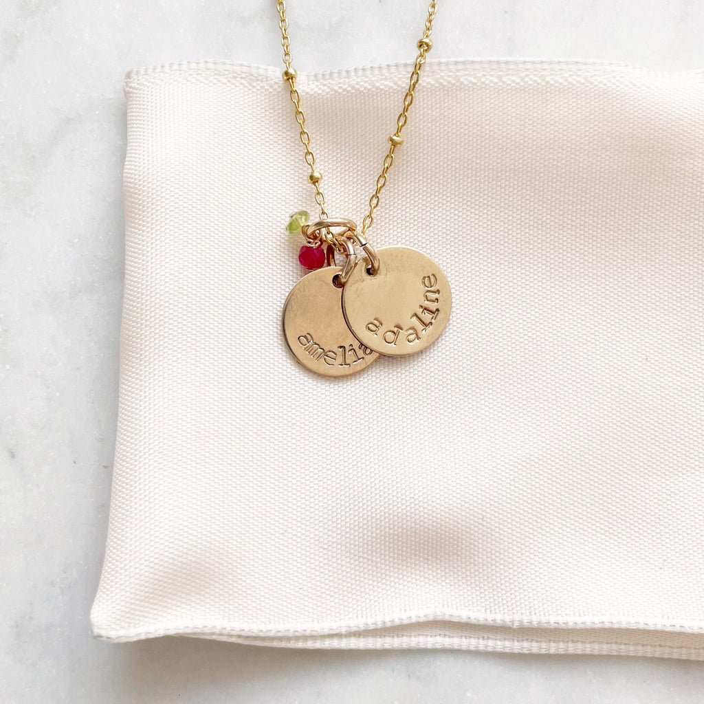 Gold stamped disc necklace with link ball chain and 2 personalized stamped name discs and wire wrapped gemstones. Stella Necklace by Sarah Cornwell Jewelry