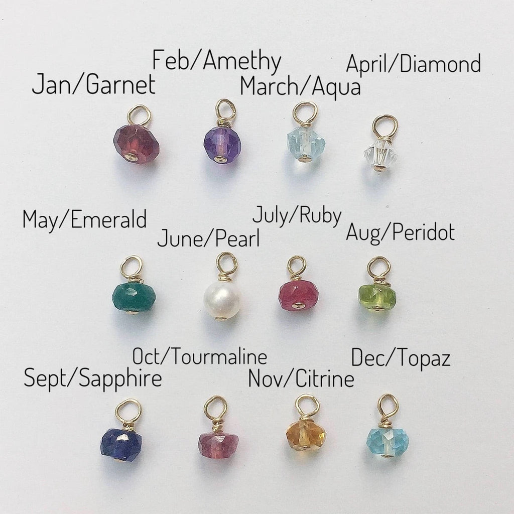 Chart with wire wrapped birthstone gemstones for each month of the year by Sarah Cornwell Jewelry
