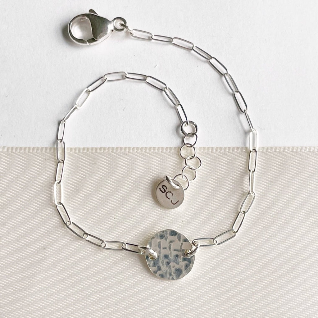 Silver rectangle chain bracelet with silver textured disc. Westport Bracelet bySarah Cornwell Jewelry